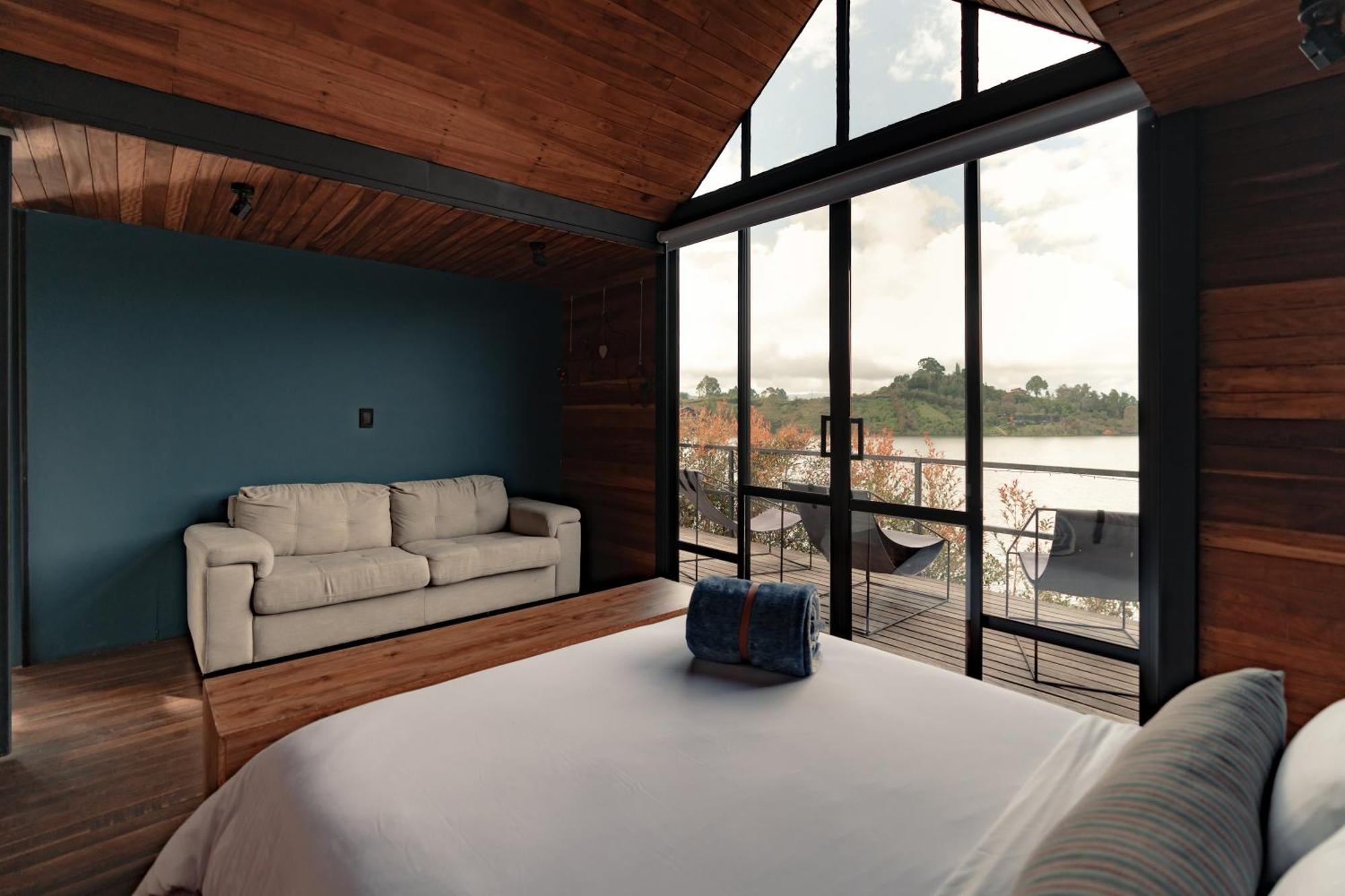The Boato Hotel Guatape Luaran gambar A bedroom in a house